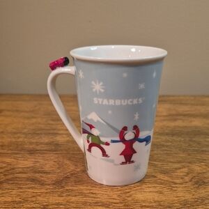 STARBUCKS 2011 Festive Holiday Skaters and Sledding Dog Mug with 3D Airplane